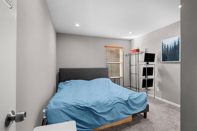 carpeted bedroom with recessed lighting and baseboards