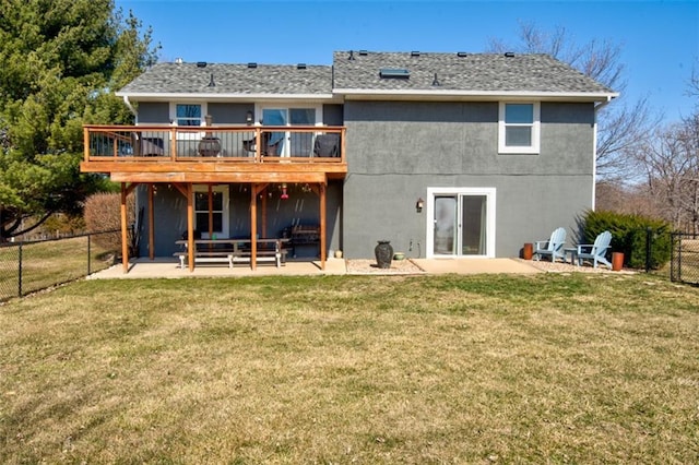 rear view of property with a patio area and a lawn