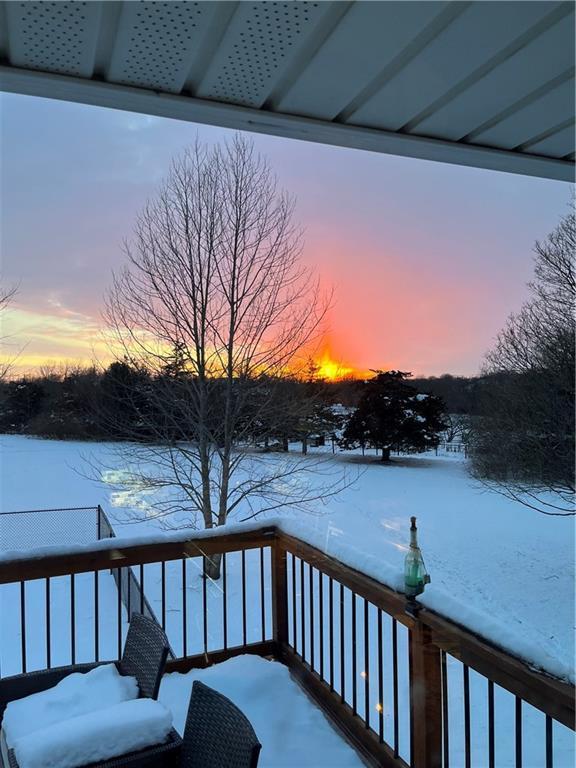 view of snow covered deck