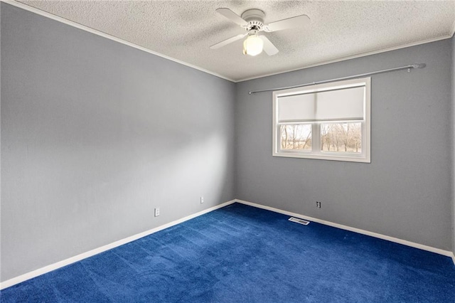 unfurnished room with carpet floors, a textured ceiling, ceiling fan, and crown molding