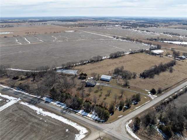 birds eye view of property featuring a rural view