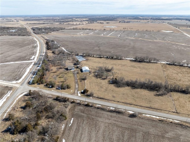 birds eye view of property featuring a rural view