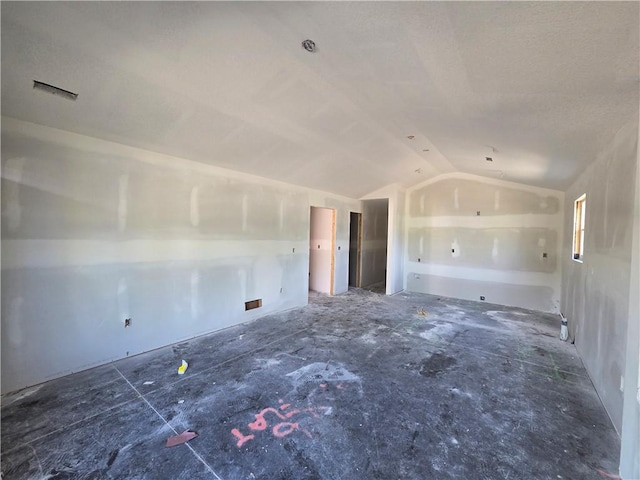 542 N Lexington St, Adrian, MO 64720 - unfurnished room featuring lofted ceiling