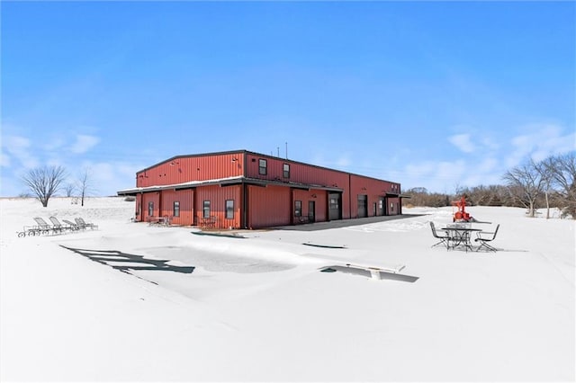 view of snow covered building