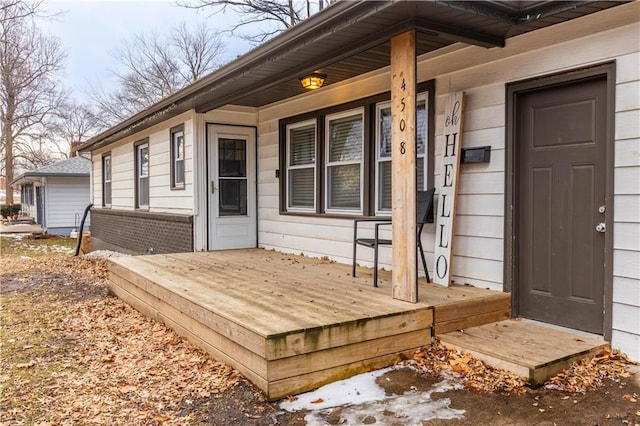 entrance to property with brick siding