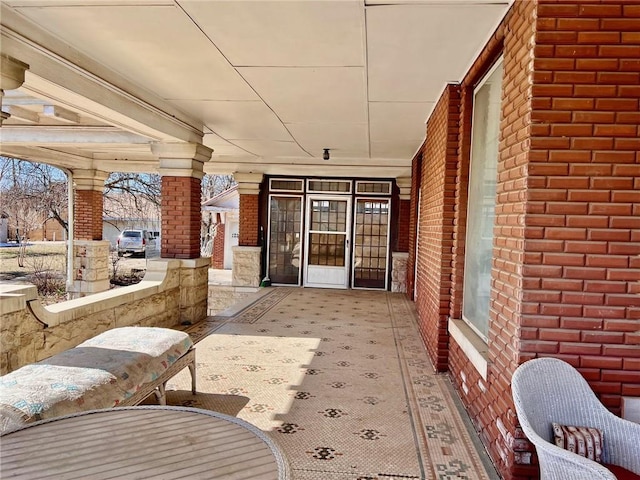 view of patio featuring a porch