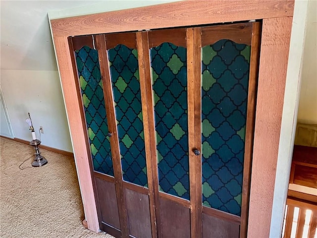 interior details featuring french doors, carpet, and baseboards