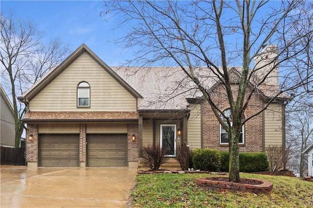 view of front of home with a garage, concrete driveway, brick siding, and a shingled roof