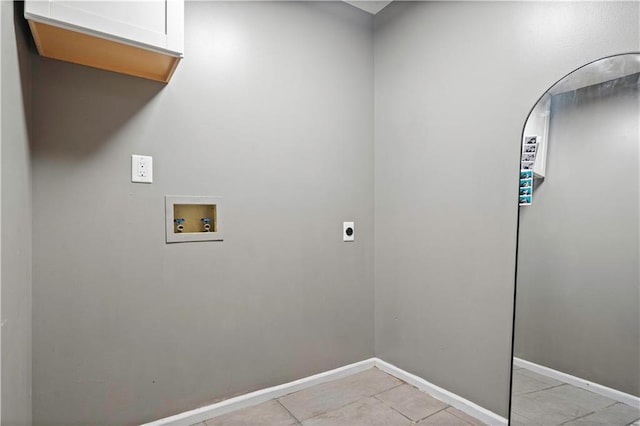 washroom with cabinet space, light tile patterned floors, baseboards, hookup for a washing machine, and hookup for an electric dryer