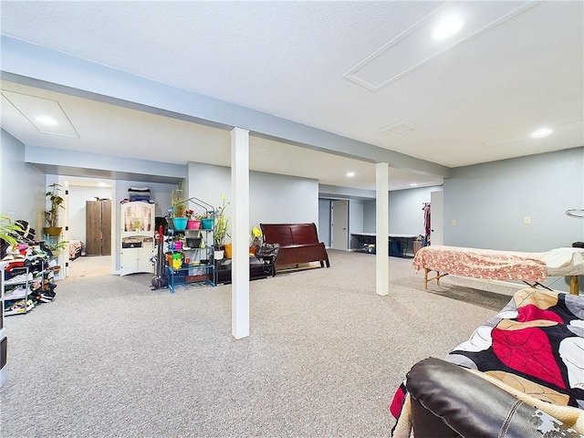 finished basement with carpet floors and recessed lighting