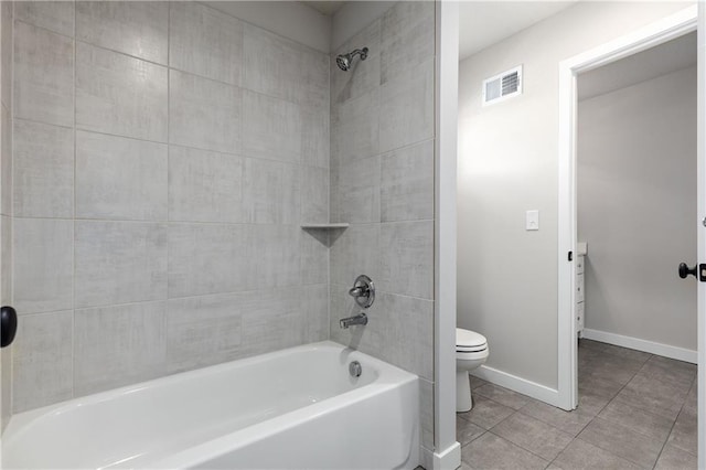 full bathroom featuring visible vents, baseboards, toilet, shower / bathing tub combination, and tile patterned floors