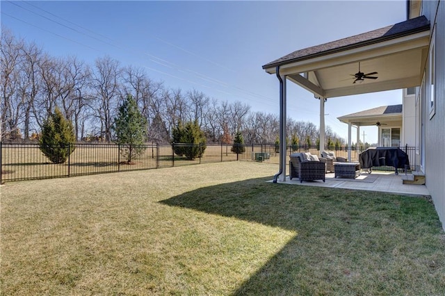 view of yard with a fenced backyard, a patio, outdoor lounge area, and ceiling fan