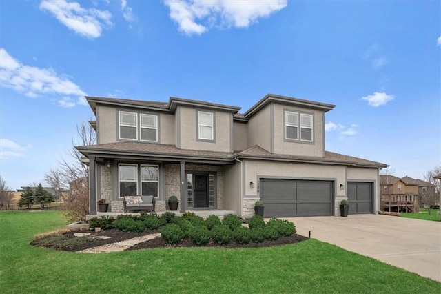 prairie-style house with an attached garage, covered porch, stucco siding, a front lawn, and concrete driveway