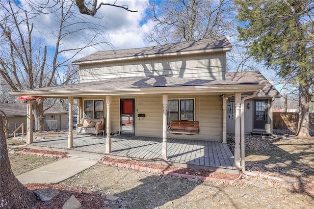 farmhouse inspired home with covered porch