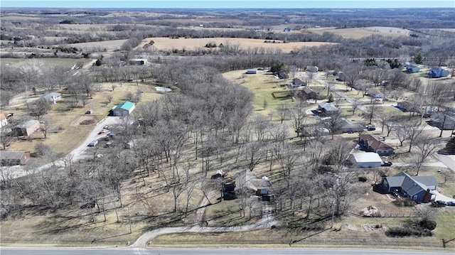 birds eye view of property featuring a rural view