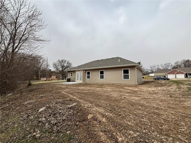 rear view of house featuring a patio area