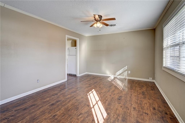 unfurnished room featuring a textured ceiling, baseboards, dark wood-style flooring, and ornamental molding