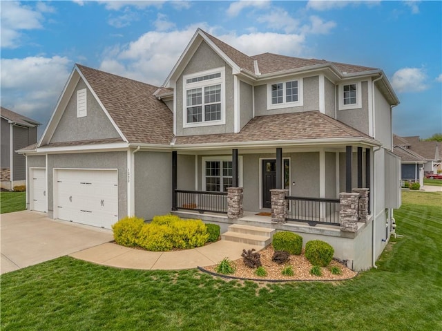 view of front of property with covered porch, driveway, a garage, a front lawn, and stucco siding