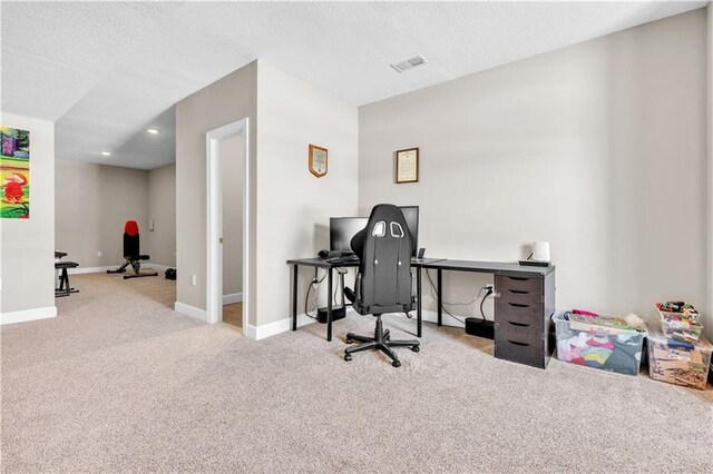 carpeted home office with visible vents, recessed lighting, and baseboards
