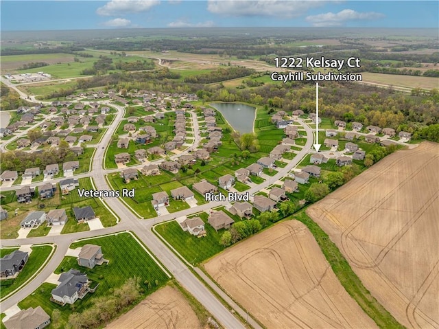 aerial view featuring a water view and a residential view