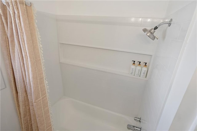 full bathroom featuring shower / bath combination with curtain