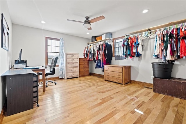 office space with light wood finished floors, recessed lighting, baseboards, and a ceiling fan