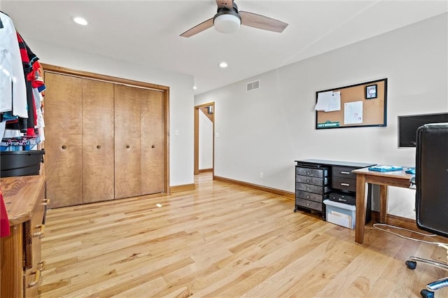 office space featuring visible vents, a ceiling fan, recessed lighting, light wood finished floors, and baseboards