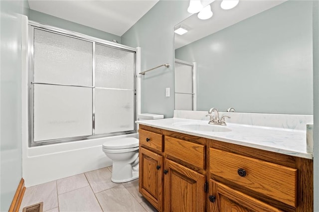 full bathroom with visible vents, enclosed tub / shower combo, toilet, and vanity