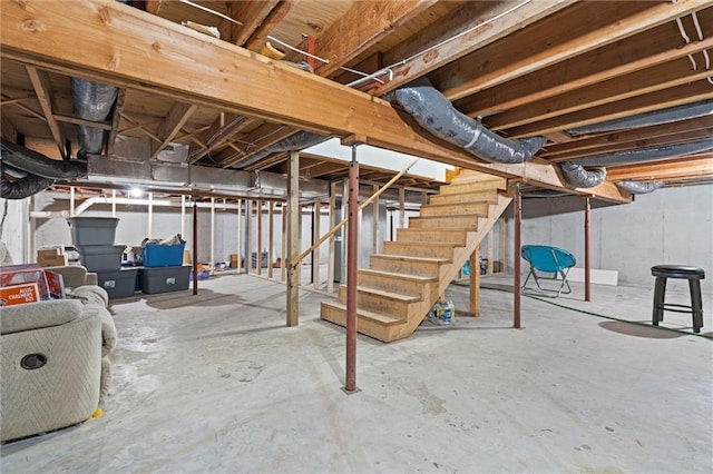 unfinished basement featuring stairway