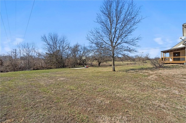 view of yard with a deck