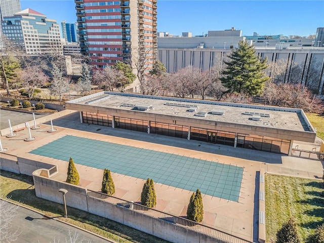 view of pool featuring a view of city