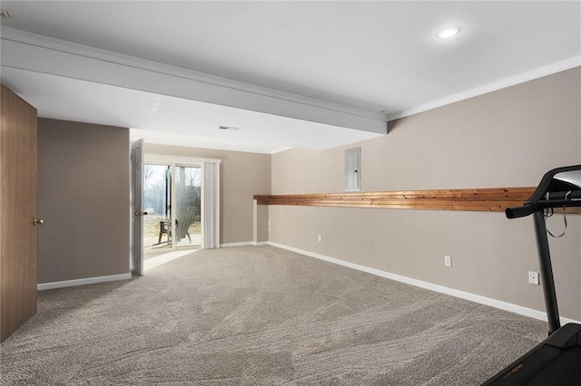 workout room featuring electric panel, baseboards, carpet flooring, and crown molding