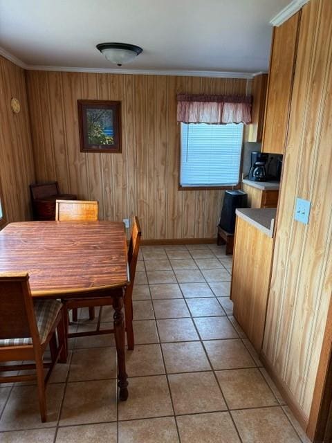 239 Mallard Ln, Big Lake, MO 64437 - dining space with light tile patterned floors, baseboards, and ornamental molding