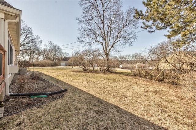 view of yard with central AC