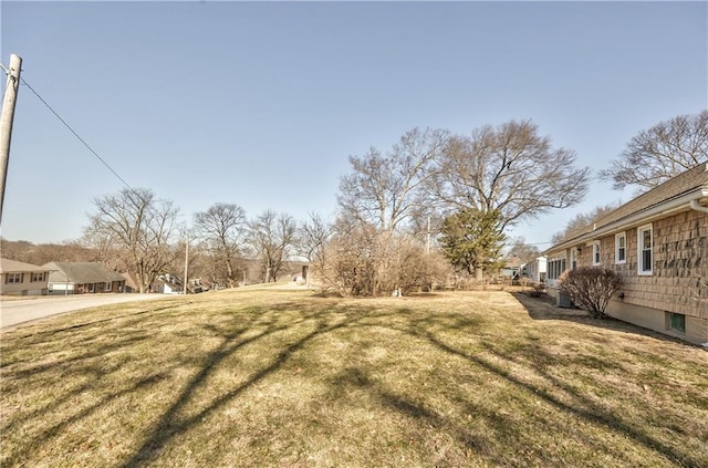 view of yard featuring a residential view