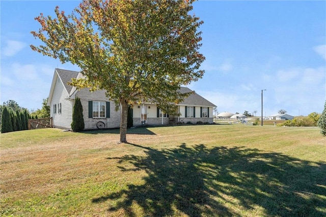 view of front of home with a front lawn