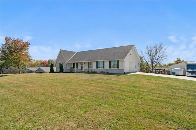 view of front of house featuring a front yard and driveway