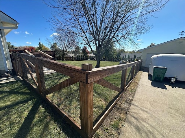 exterior space with a yard and an outbuilding