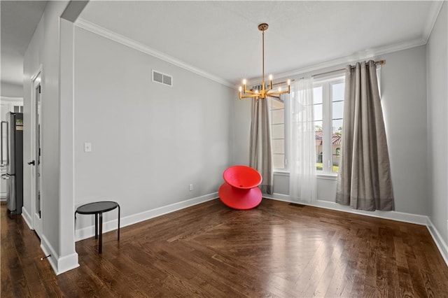 dining room with wood finished floors, visible vents, baseboards, an inviting chandelier, and crown molding