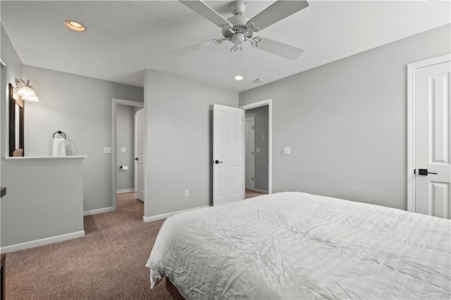 carpeted bedroom featuring ceiling fan, recessed lighting, and baseboards