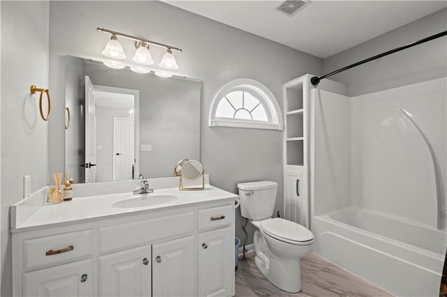 bathroom featuring toilet, vanity, visible vents, marble finish floor, and tub / shower combination