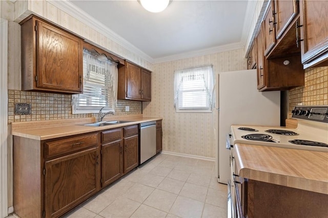 kitchen with white electric stove, a sink, light countertops, dishwasher, and wallpapered walls