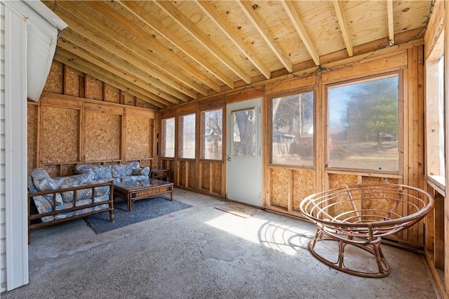 sunroom with lofted ceiling