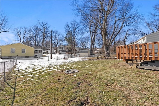 view of yard with a fenced backyard and a wooden deck