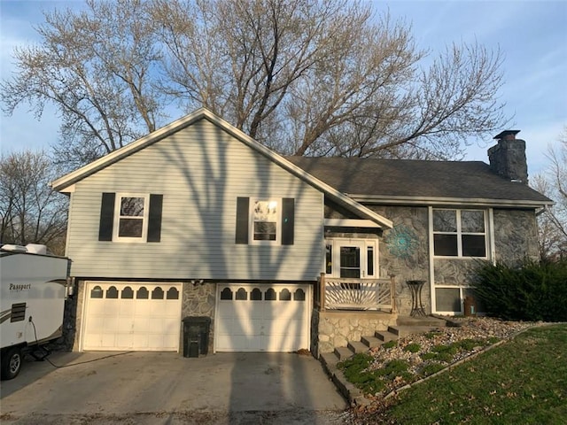 view of front facade with a garage, stone siding, a chimney, and concrete driveway