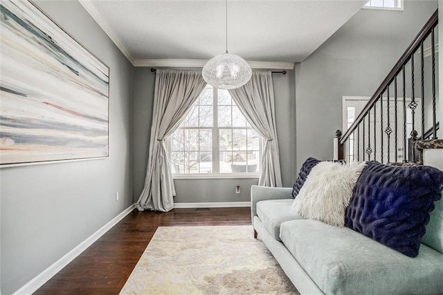 living area featuring crown molding, stairs, baseboards, and dark wood-style flooring