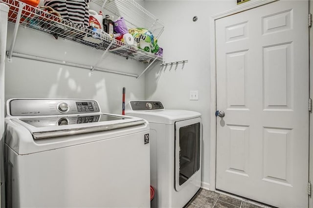 laundry area with laundry area and separate washer and dryer