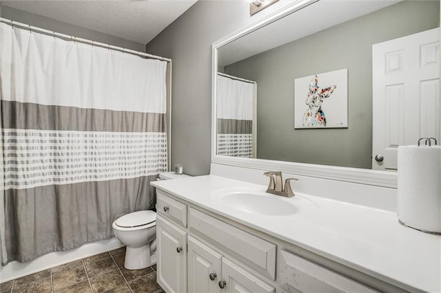 bathroom with toilet, vanity, tile patterned floors, shower / bath combination with curtain, and a textured ceiling