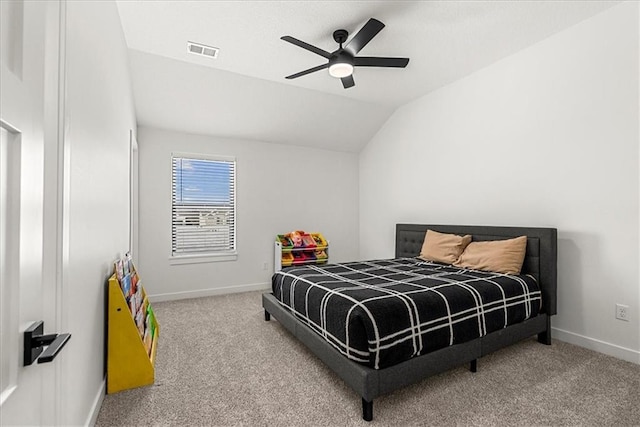 bedroom with visible vents, carpet, baseboards, ceiling fan, and vaulted ceiling