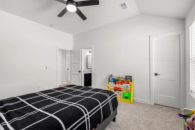 bedroom featuring visible vents, ceiling fan, carpet, and vaulted ceiling